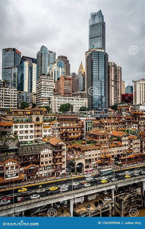 Vertical Cityscape Of The Skyline Of Chongqing At Dusk With Illuminated