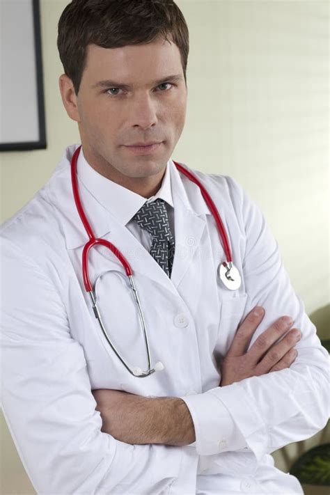 Portrait Of A Doctor Holding A Clipboard Stock Photo Image Of