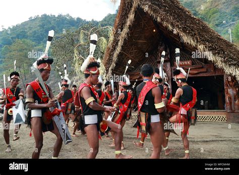 Naga Tribesmen From Konyak Tribe Perform A Dance In Front Of Their