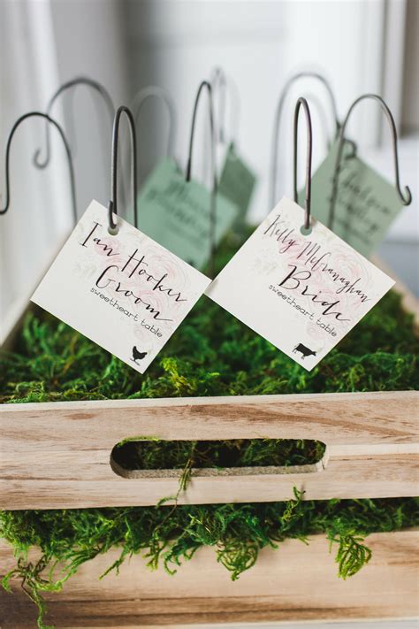 We've got you covered with more escort card ideas. Classic, DIY Hanging Escort Cards