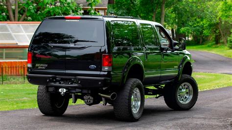 Lifted Diesel Ford Excursion Rolls Over The Competition Ford Trucks