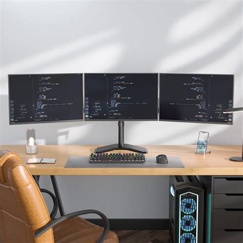 Enhance Productivity Using a 3 Monitor Stand - Compass Chiropractic