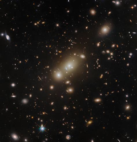 Hubble Space Telescope Spots X Ray Bright Galaxy Cluster Scinews