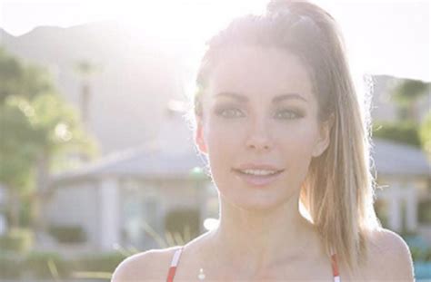 crystal hefner shares racy bikini pic after removing her breast implants