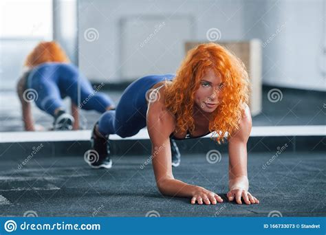 Doing Plank Sporty Redhead Girl Have Fitness Day In Gym At Daytime