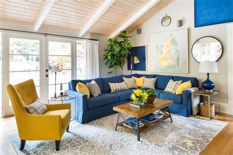 While burgundy curtains look striking paired with gray walls, a single block of the deep red color just on the windows sticks out like a sore thumb. Family Room | Living Room | Decorating with Blue & Yellow ...