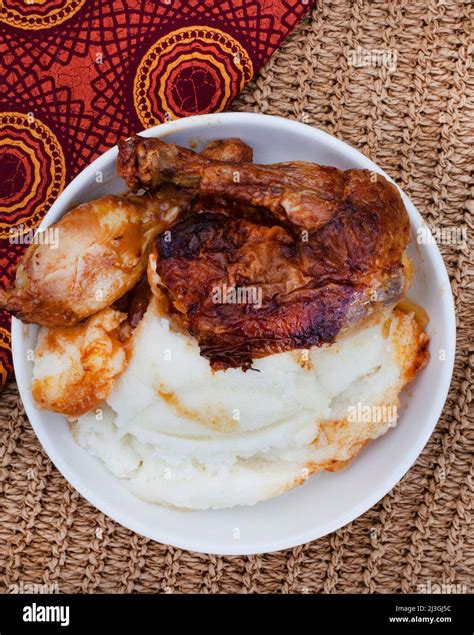 Traditional South African Pap And Quarter Chicken Maize Meal With