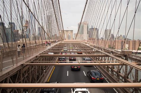 Cars And Pedestrians On Brooklyn Bridge New York City Editorial Photo