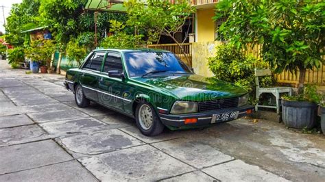 Green Peugeot 505 Sedan Parked On The Front Of A House Editorial Stock