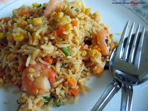 Nasi goreng is the popular indonesian fried rice which is traditionally served with a fried egg. http://recipewarehouse.blogspot.com/2010/02/shrimp-fried ...