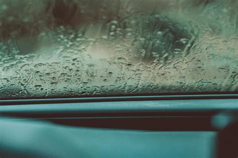 premium photo inside a car on a rainy day