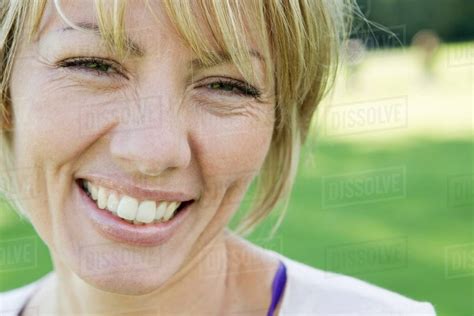 Close Up Of Womans Smiling Face Stock Photo Dissolve