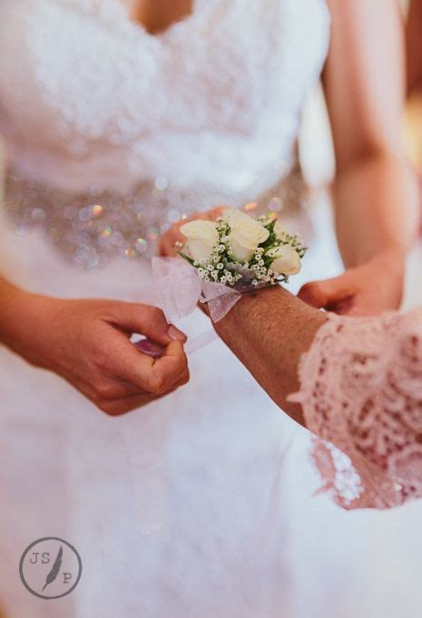 Mothers Wrist Corsage With White Spray Roses And Babys Breath White