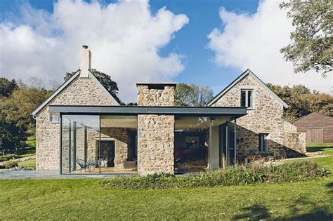 Single Storey Steel Framed Glass Extension To A Traditional Stone