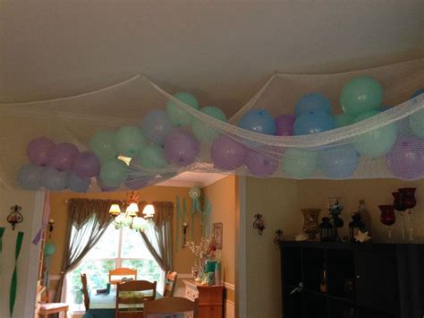 You will want to place your rigging points in the ceiling as close as possible to the same distance apart as these rings. Under the sea decorations - I found netting for $1 a yard ...