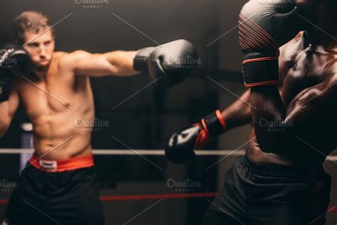 Man Punching Stomach High Quality Sports Stock Photos ~ Creative Market