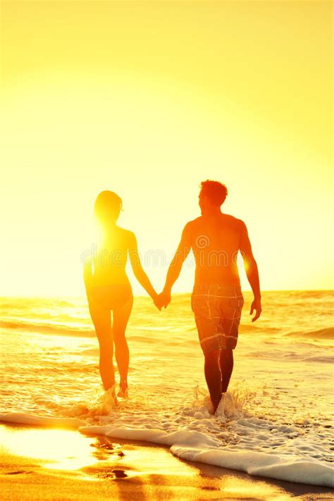 Beach Couple Holding Hands Together At Sunset Stock Image Image Of