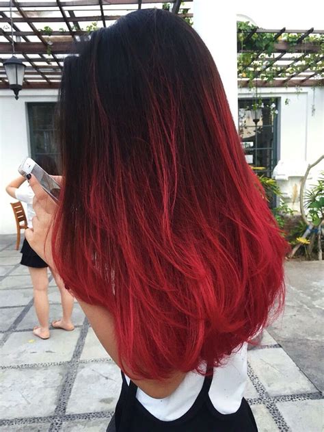 A black ombre hair color is when your hair is gradually blended from a black hue to another color hue. © jennifer wizzar | red ombre hair | Wine hair, Red ombre ...