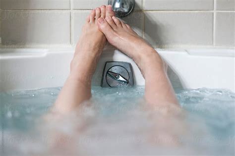 Woman S Bare Feet Relaxing In A Hot Bubbling Bathtub By Stocksy Contributor Holly Clark