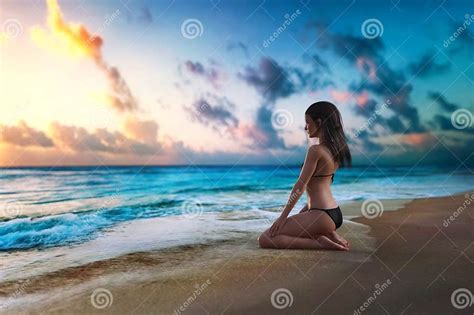 illustration of a beautiful woman kneeling on a beach near the surf and watching a colorful