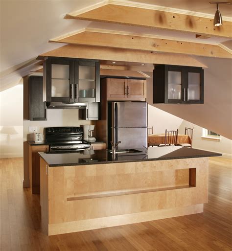 A detailed coffered ceiling adds dimension and character to this. 49 Contemporary High-End Natural Wood Kitchen Designs