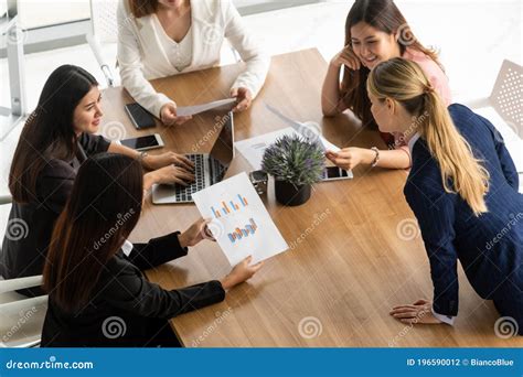 Businesswomen In Meeting Laptop Computer On Table Stock Photo Image