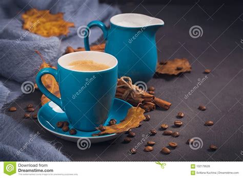 Ready the comments i noticed i have to clarify one point and that is i'm looking for canned brewed or maybe you heard a great coffee joke, bought an awesome new coffee mug or found a. Blue Cup Of Coffee With Coffee Beans And Autumnal Dry Leaves Stock Photo - Image of bean ...