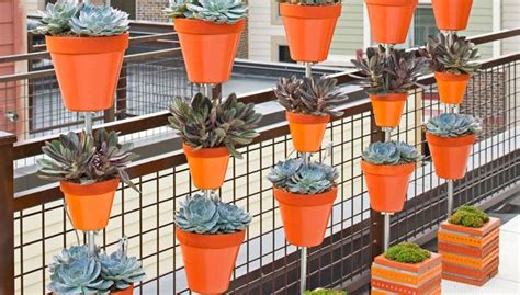 This plant stand from yimobra is made of iron, which makes it durable enough to hold up to 300 this plant stand from desheng is tall and skinny and can store a variety of plants without taking up too. Stacked Flower Pot Planter Stands | Stacked flower pots ...