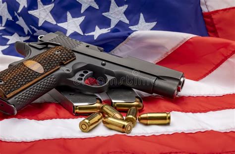 Gun And Bullets Semi Automatic Pistol Handguns With Ammunitions On An