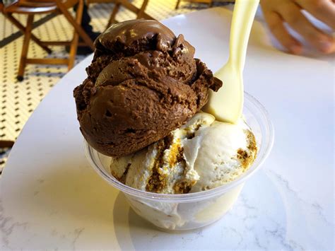 Ice Cream Flavor Frozen Dessert Pattern In White Cup Hand Holding On