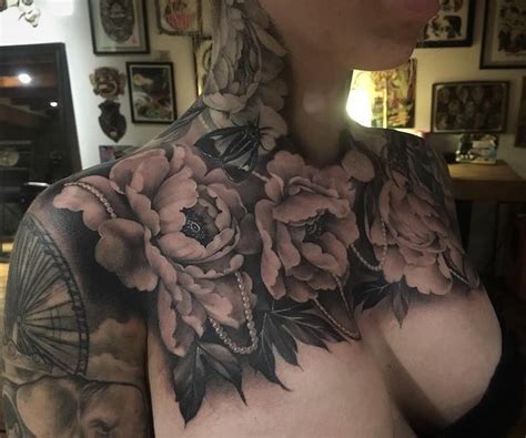 This vibrant chest piece cover up nicely hides an old tattoo commemorating a past relationship. Chest Piece Tattoos | Chest piece tattoos, Chest tattoos ...