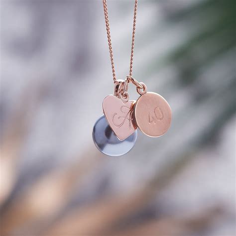 Is there a more classic duo? Rose Gold Pearl Necklace With Monogram Charm By Claudette Worters | notonthehighstreet.com