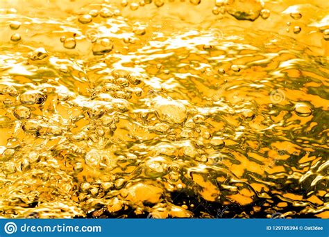 Liquid Gold Bubbles In Water Or Oil Stock Photo Image Of