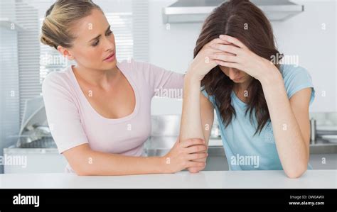 Woman Comforting Her Upset Friend Stock Photo 67006070 Alamy