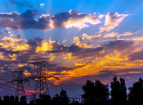 Electricity Pylons And Lines At Dusk At Sunset Stock Photo Image Of