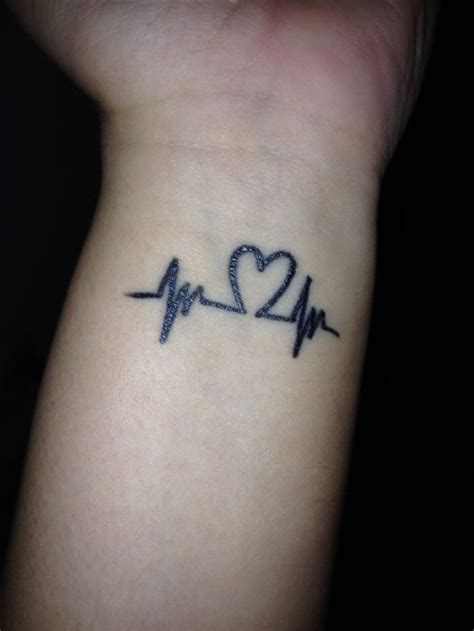 28 heart tattoo with heartbeat effemy