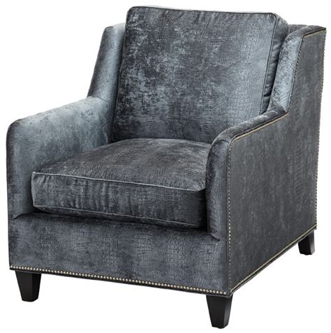Adding an accent chair or two to your modern and contemporary living room or bedroom is a great way to increase the seating space of a room while adding a touch of style and color. Ultra modern gator print accent chair
