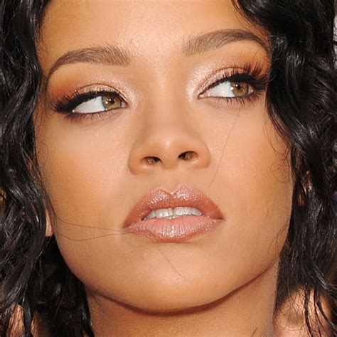 rihanna makeup blue eyeshadow brown eyeshadow silver eyeshadow and pale pink lipstick steal