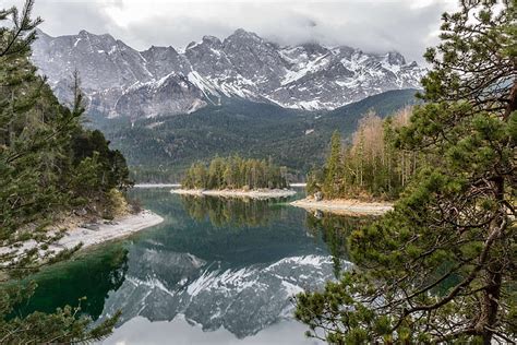 Calm Waters Clouds Conifer Daylight Environment Evergreen Forest