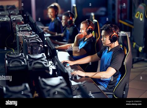 Play To Win Multiracial Team Of Professional Cybersport Gamers Wearing