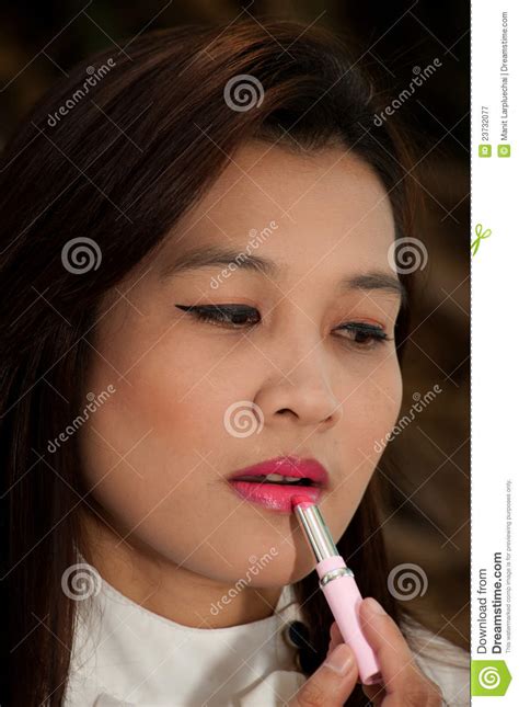 Asian Woman Applying Make Up Stock Image Image Of Body Model 23732077