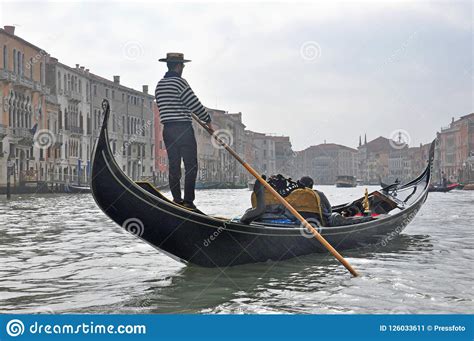 Man Driving Gondola Boat In Venice Italy Editorial Photo Image Of