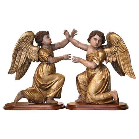 Pair Of 18th Century Italian Puttini In Giltwood For Sale At 1stdibs