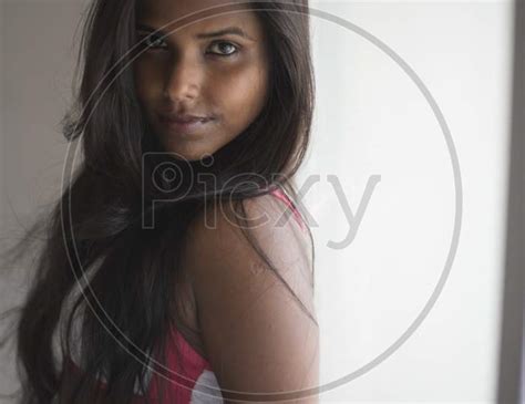 Image Of Portrait Of An Attractive Young Brunette Dark Skinned Indian