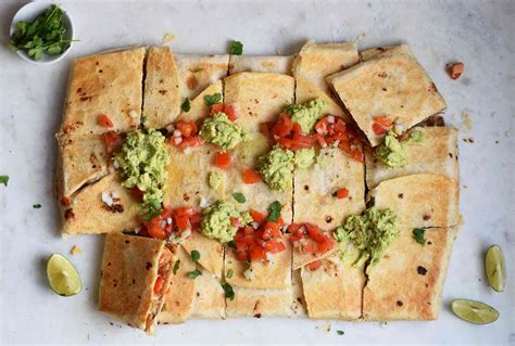 Brush your butter across the base of a sheet pan. Sheet pan Chicken Fajita Crunchwrap