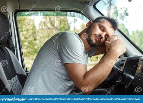 Driver Fell Asleep At The Wheel Of A Car Royalty Free Stock Photo