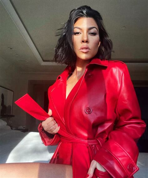 Kourtney Kardashian Goes Nude Under Red Satin Sheet In Steamy Fragrance