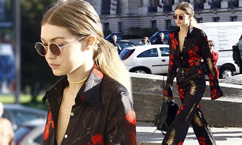 Gigi Hadid Flashes Her Lacy Black Bra In A Chic Floral Suit As She Steps Out During Pfw Daily