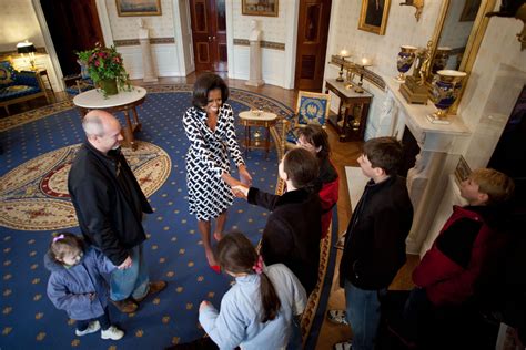 Photos First Lady Michelle Obama Surprises White House Visitors