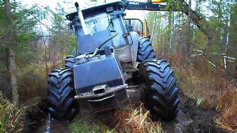 Watch The Valtra Forestry Tractors Powerful Work In The Wettest Conditions